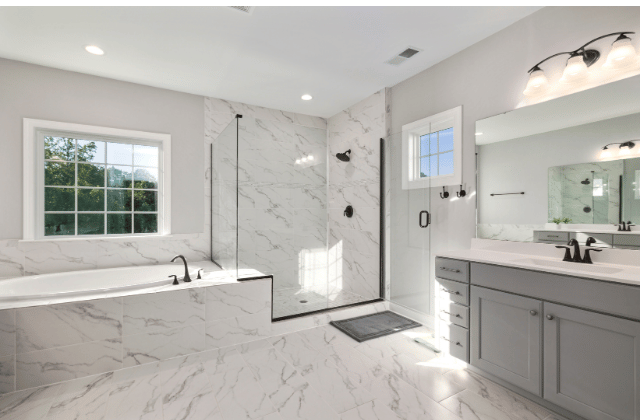 Natural stone granite tiles give the bathroom a contemporary edge